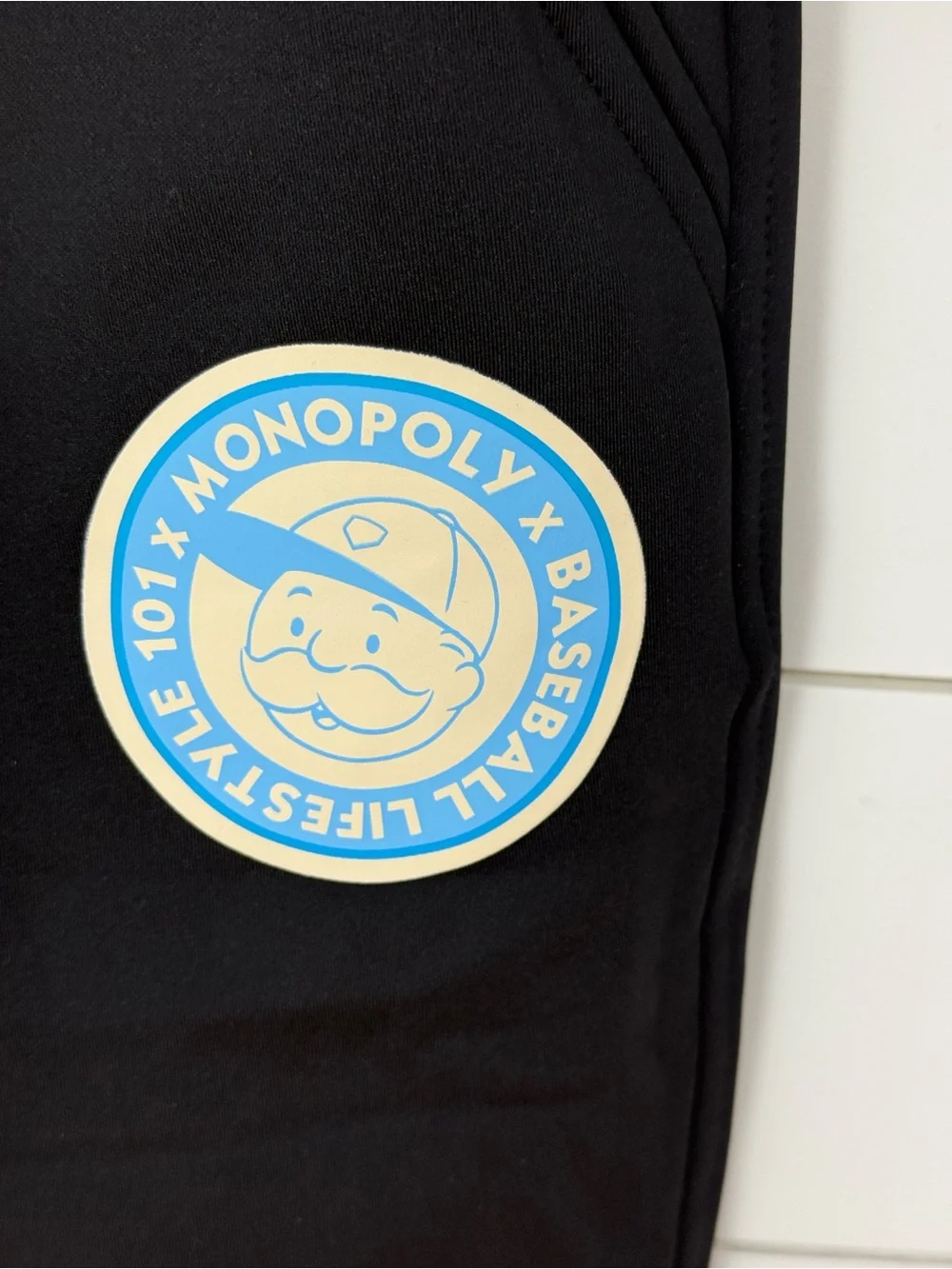 Black Kids Joggers with Light Blue Badge Accents